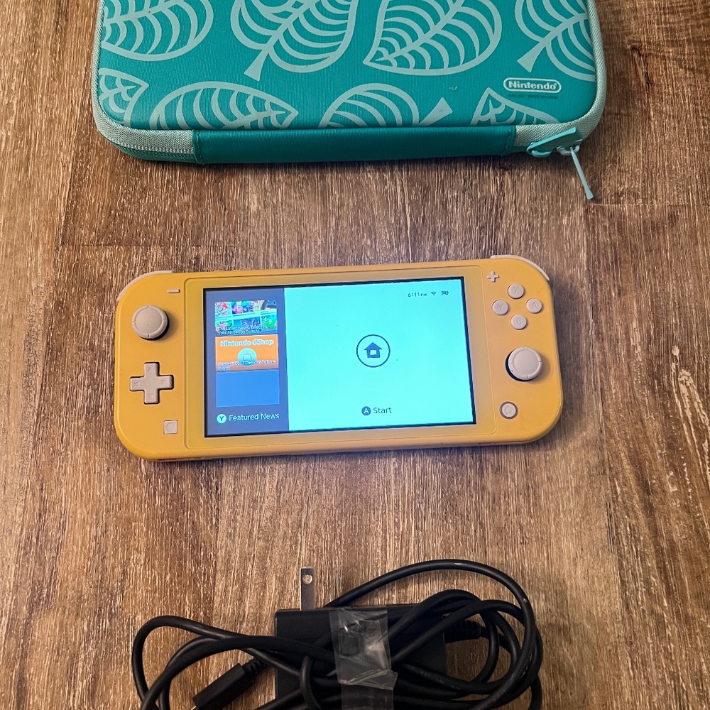 Nintendo Switch Lite – Yellow with Case - Picture 3 of 3